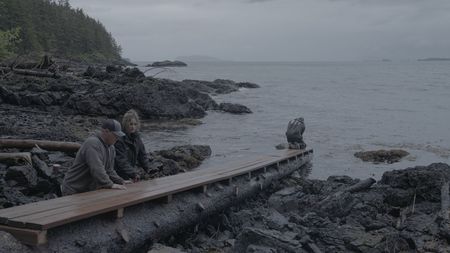 Troy Brockway, Sarah McDonald, and David Squibb construct a ramp from the beach up to Troy's property. (National Geographic/Gil Cano)