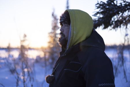 Tig Strassburg checks his trapline during the winter season. (National Geographic/Wayne Shockey)