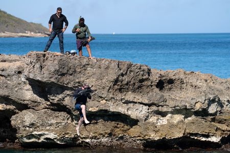 Contributors watch as Gordon Ramsay dives for lionfish in Cuba. (National Geographic/Justin Mandel)