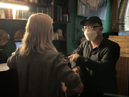 V explains to Mariana van Zeller how his team of investigators are breaking the case of women being trafficked into China as brides. (National Geographic)