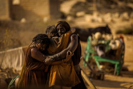 Aurelia Masuri, played by Angelina Chudi, Marcus Masurius, played by Theo Ogundipe, and Avianius, played by Frankie Treadaway, reunite at the Pompeii displacement camp. (National Geographic/Darrin Zammit Lupi)