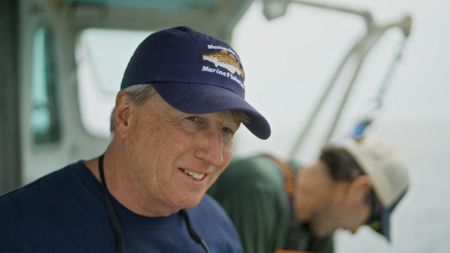 Greg Skomal while working with local lobstermen to put out special acoustic receivers. Part of a huge network that tracks the movements of sharks and fish along the entire US Atlantic Coast. (National Geographic/James Blake)