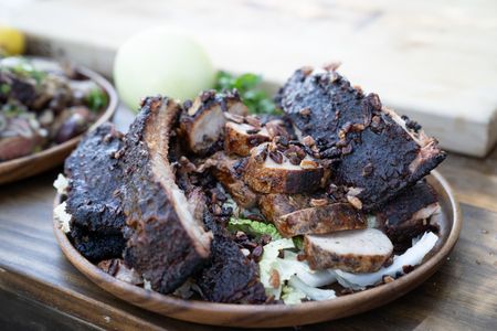 TX - Grilled ribs and tenderloin finished with barbeque sauce and toasted pecans. (Credit: National Geographic/Justin Mandel)