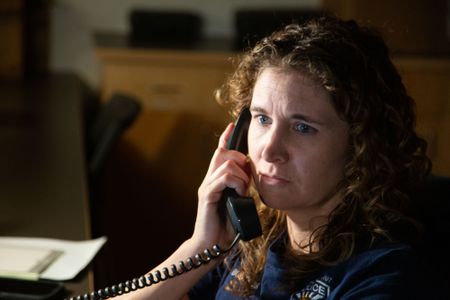 Stephanie Bourgeois, Crime Scene Technician, Apache Junction PD, makes calls to investigate the possible whereabouts of the relatives of Jane Doe. (National Geographic/Tom Beard)