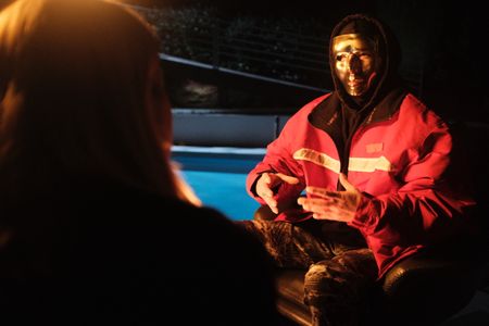 Mariana van Zeller interviews Michael about his past as an operations manager at Rodeo Recovery. (National Geographic)