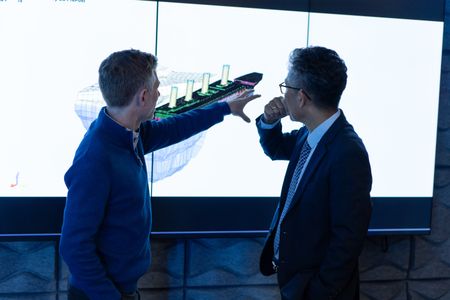 Simon Benson and Jeom Kee Paik explain the results of a simulation of the Titanic sinking. (National Geographic/Gary Moyes)