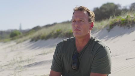 Lee Jonsson, contributor, reflecting back on his morning that lead up to his shark attack encounter while surfing. (National Geographic)