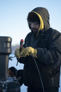 Tig Strassburg sets wolverine traps. (National Geographic/Patrick Henderson)