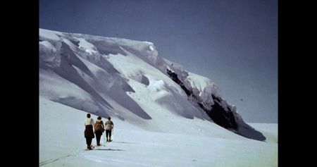 Women walk in skis on glacier.  (credit: Archival Materials Courtesy of Andri Snþr Magnason)