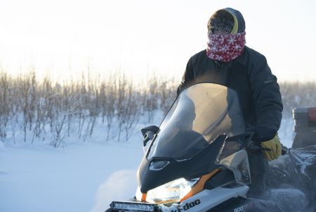 Tig Strassburg sets fur traps along his trapline. (National Geographic/Patrick Henderson)