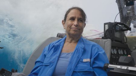 Mithriel Mackay in one of the OceanXplorer's submersibles on the way down to test her hypothesis that male humpback whales use the topography of the island to acoustically enhance their songs. (National Geographic)
