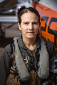 Student Captain Steph Harris poses next to a T-45. (Credit: National Geographic/Freddie Claire)