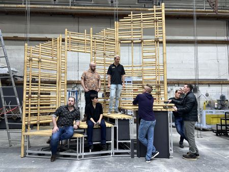 The team working on the Disney Treasure's new stage show, "Disney The Tale of Moana," reviews the scenic pieces at a studio in Hamburg.  (credit: National Geographic/Mirella Pappalardo)