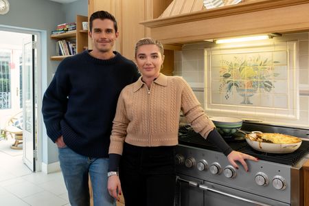 Antoni Porowski and Florence Pugh in Granny Pat's kitchen. (National Geographic/Chris Raphael)