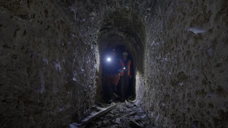 Claudio Lozano investigates the tunnels under C·diz with expert Euegenio, in Spain. (National Geographic)