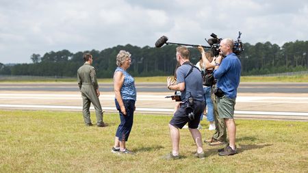 Jo Anne Nissly, director Chris Parkin, and camera Charlie Laing on family day. (Credit: National Geographic/Freddie Claire)