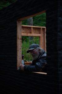 Terry Simpson is grateful for his neighbors' help in building him a new cabin. (National Geographic/Robert Jolley)