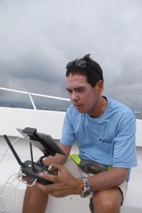 Stephen Kajiura filming sharks with his drone in the shallows of Hollywood, Florida. (National Geographic/Mariana Kneppers)