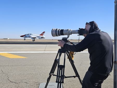 Stills photographer Freddie Claire captures a T-45 coming in to land. (Credit: National Geographic/Lyndsi Gutierrez)