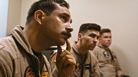 Student LTJG Spenser Neel in a pre-flight briefing. (Credit: National Geographic)