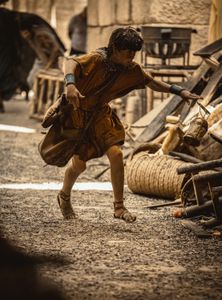 Avianius, played by Frankie Treadaway, sprints through the streets of Pompeii, desperately running to escape the pyroclastic flow. (National Geographic/Darrin Zammit Lupi)