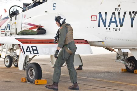Student LTJG Dylan Horan doing his pre-flight checks. (Credit: National Geographic/Freddie Claire)