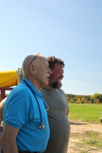 Dr. Pol and Charles Pol look at the farm's sheep hut to come up with ideas to drain the sheep's excrements. (National Geographic)