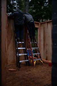 Terry Simpson is grateful for his friend David Squibb's help in building him a new cabin. (National Geographic/Robert Jolley)