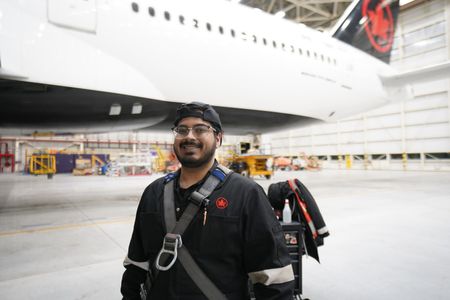 Junior Aircraft Maintenance Engineer, Air Canada, Sameer Baboolal at the Air Canada Hangar. (Arrow International Media Ltd & Cantina Media)