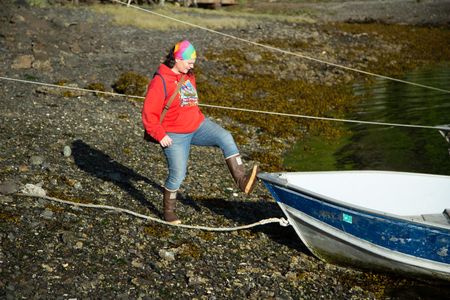 Veronica Arrants returns to her skiff after berry-picking. (National Geographic/Wayne Moss)