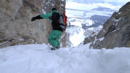 Jeremy Jones snowboards on a mountain in the Teton Range, Wyoming.  (credit: Teton Gravity Research)