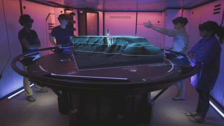 Zoleka Filander, Eric Stackpole, Kerri Seger and Mithriel Mackay are in the Hololab analyzing the results of Mithriel's acoustic experiment. (National Geographic)