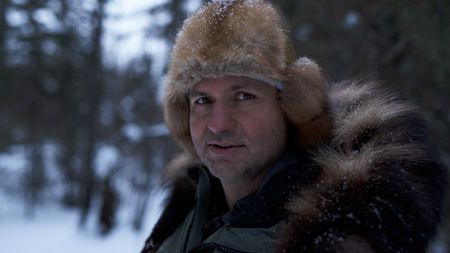 Jamey Joseph grouse hunting for subsistence food during the winter season. (National Geographic/Ashton Hurlburt)