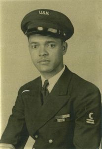George Bland is seen in close-up portrait. "Erased: WW2's Heroes of Color" tells the stories of three Black heroes who miraculously survived the attack on Pearl Harbor. One of these men is George Bland, who served as mess attendant on the USS West Virginia. (The Family of George Bland/Frank Bland)