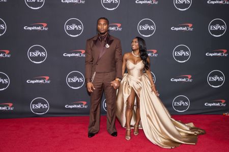 JONATHAN OWENS, SIMONE BILES