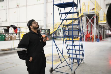Junior Aircraft Maintenance Engineer, Air Canada, Sameer Baboolal at the Air Canada Hangar. (Arrow International Media Ltd & Cantina Media)
