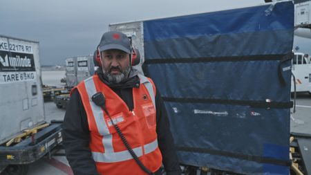 Amer Khan, Lead Station Attendant at Air Canada, oversees baggage loading at the ramp. (Arrow International Media Ltd & Cantina Media)