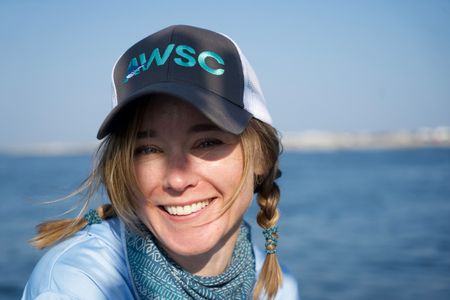 Dr. Megan Winton looks out to sea. (National Geographic/Brandon Sargeant)