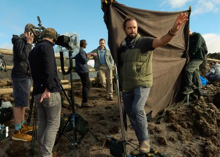 Cast and crew film atop Mt. Vesuvius, behind-the-scenes of Pompeii: Out of Time with Tom Hiddleston. (National Geographic/Paolo Verzone)
