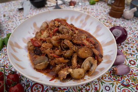 Portugal - Spicy Portuguese clams and pork. (Credit: National Geographic/Justin Mandel)