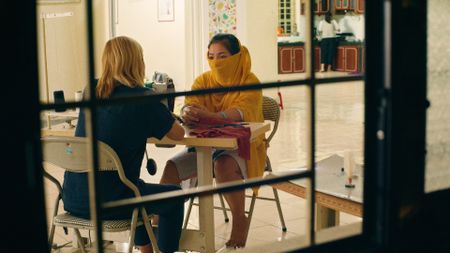 Mariana van Zeller interviews Cai, a victim of bride trafficking in Vietnam. (Credit: National Geographic)