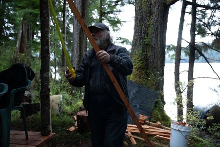 Terry Simpson is grateful for his neighbors' help in building him a new cabin. (National Geographic/Robert Jolley)