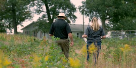 Coroner Scott McCord and Deputy Coroner Heidi McCord visit the abandoned farmhouse where serial killer Larry Eyler dumped the bodies of some of his victims in the 1980s. (National Geographic)
