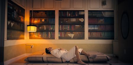 Antoni Porowski relaxes in one of the rooms at QC Spa on Governor's Island. (National Geographic)