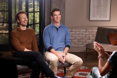GLEN POWELL, ELI MANNING