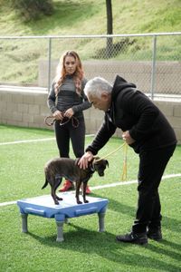 Jen and Cesar complete an exercise with Boss.   (National Geographic)