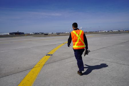 Station Attendant on the airfield.(Arrow International Media Ltd & Cantina Media)