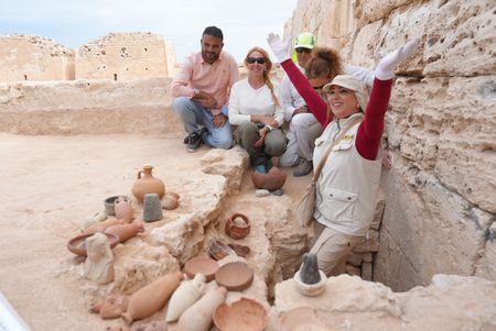 Kathleen Martinez celebrates with the team with finds at the site. (credit: National Geographic)