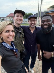 Mariana van Zeller poses behind-the-scenes with Daniel, Jeff and Kwesi in Accra, Ghana. (National Geographic/Daniel Hollis Diamond)