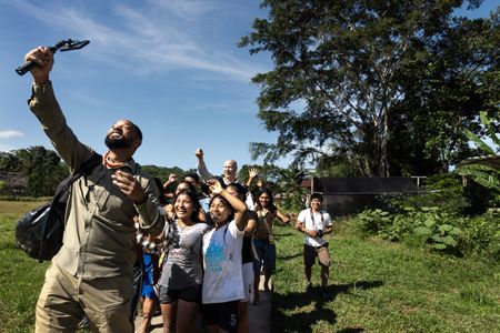 Will Smith walks with the Waorani community during an expedition for find an anaconda. (credit: National Geographic/Kyle Christy)